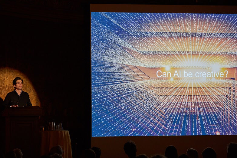 Color photograph of Dr. John R. Smith presenting at the 2018 conference, "Searching Through Seeing."