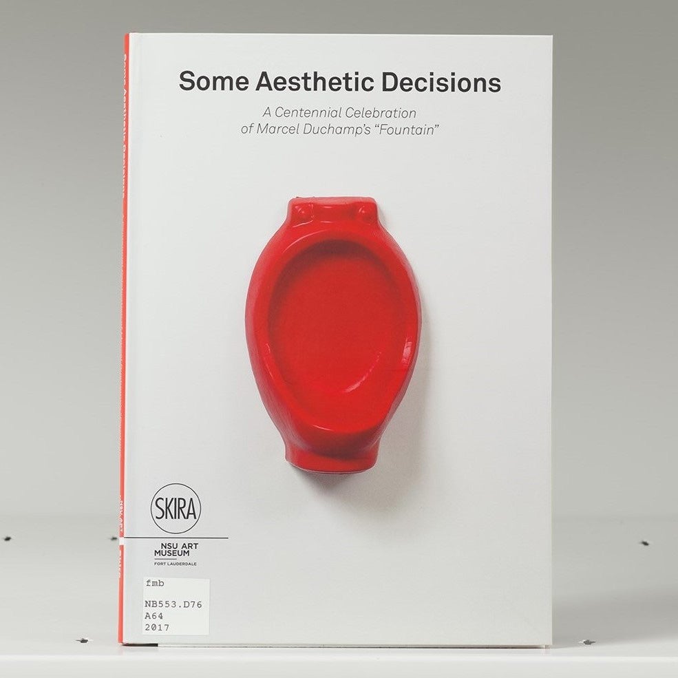 Book cover featuring a red urinal sculpture