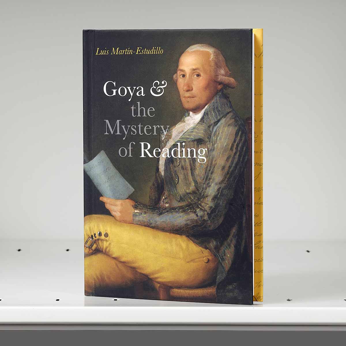 Book cover featuring an artwork of a man reading