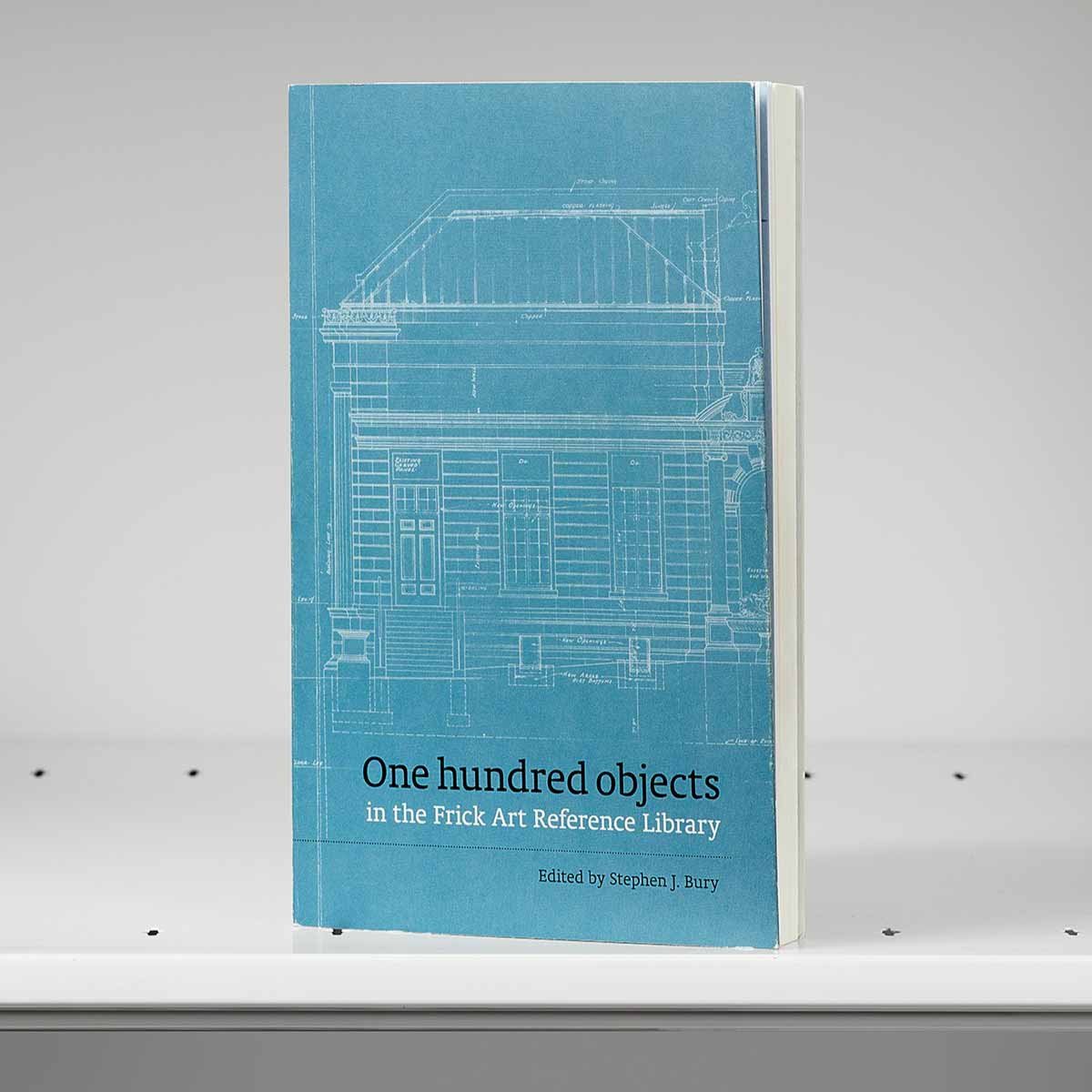 Book cover featuring blueprint architectural plans