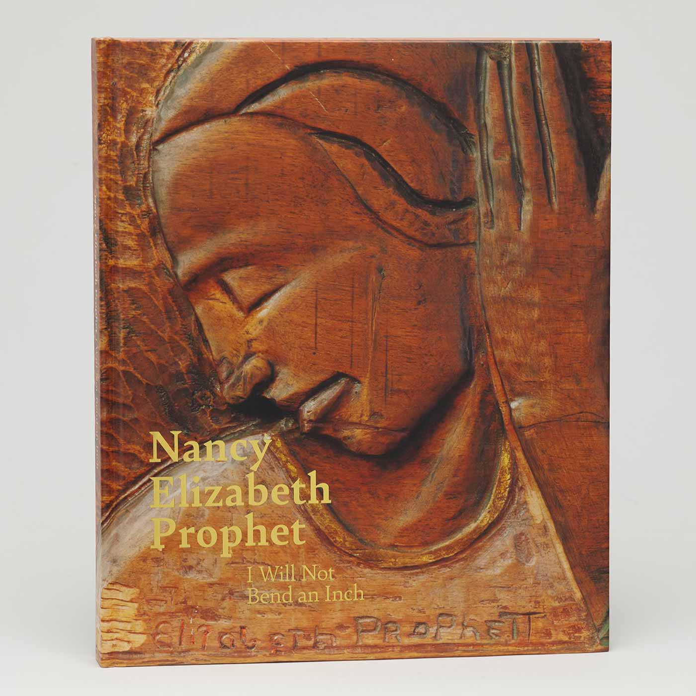 Book cover featuring a carved wooden relief sculpture of a woman in profile