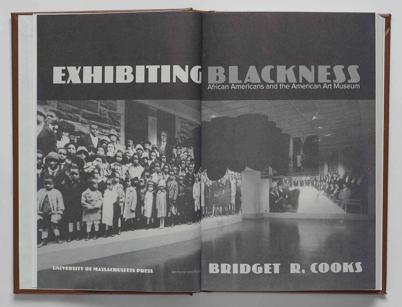 Title page spread of a book with an image of a museum gallery and the title "Exhibiting Blackness"