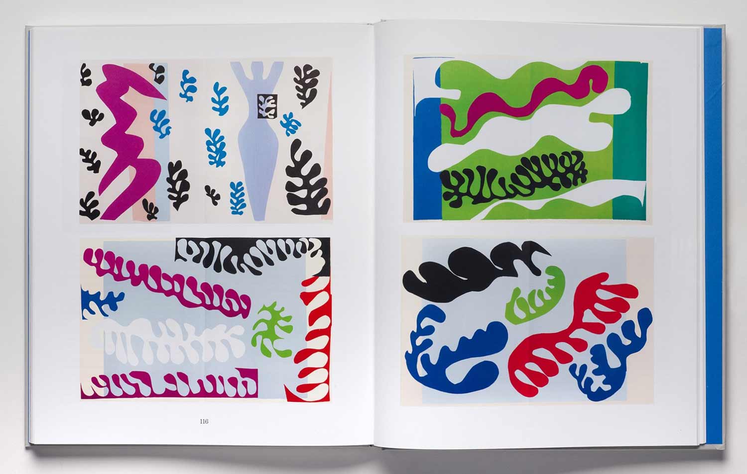 Book spread with abstract artworks featuring colorful squiggles