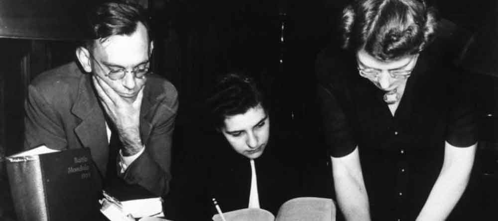 archival photo of man and two woman combing over papers, promoting podcast about helping save Europe's art