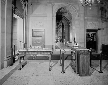 archival photo Frick's Reception Hall (Entrance Hall) including till and tables