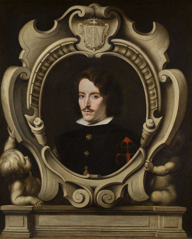 Oil portrait of man with long dark hair, in an elaborately painted frame