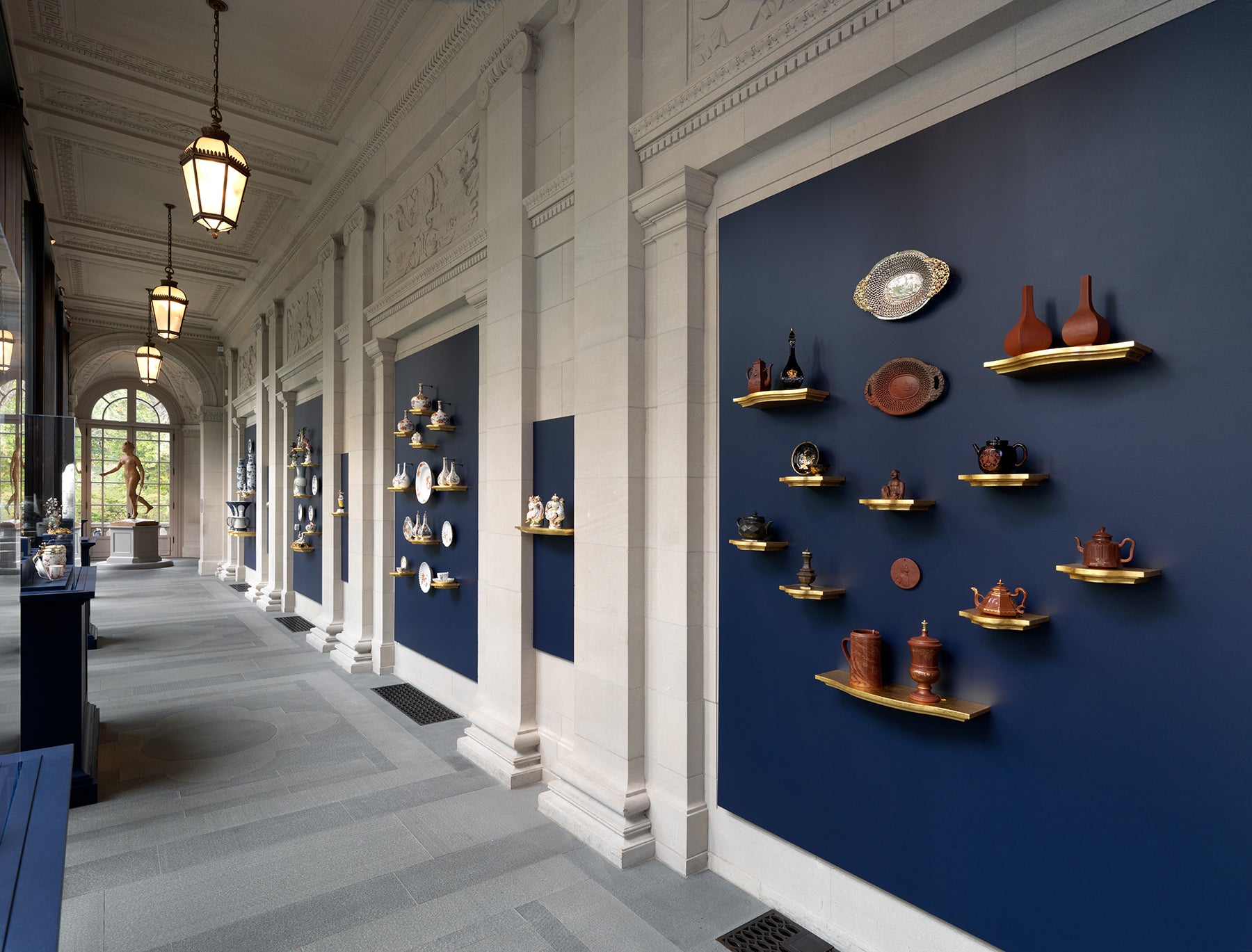 photo of Portico Galley in the Frick Collection with porcelain objects