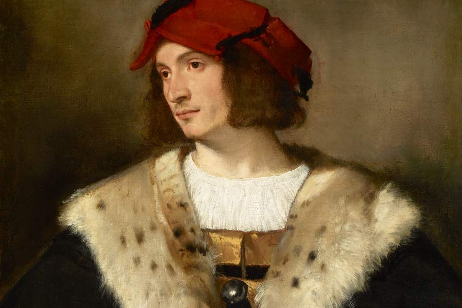 portrait of a young man in red hat and fur over his shoulders