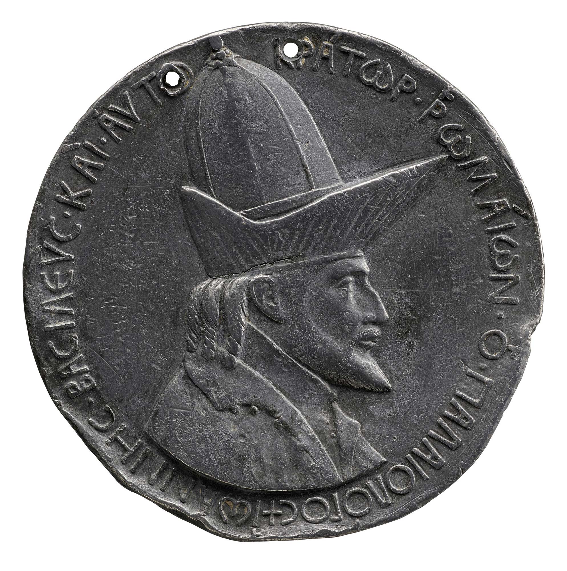 Lead portrait medal of Emperor John VIII Palaeologus wearing a large pointed hat in profile to the right