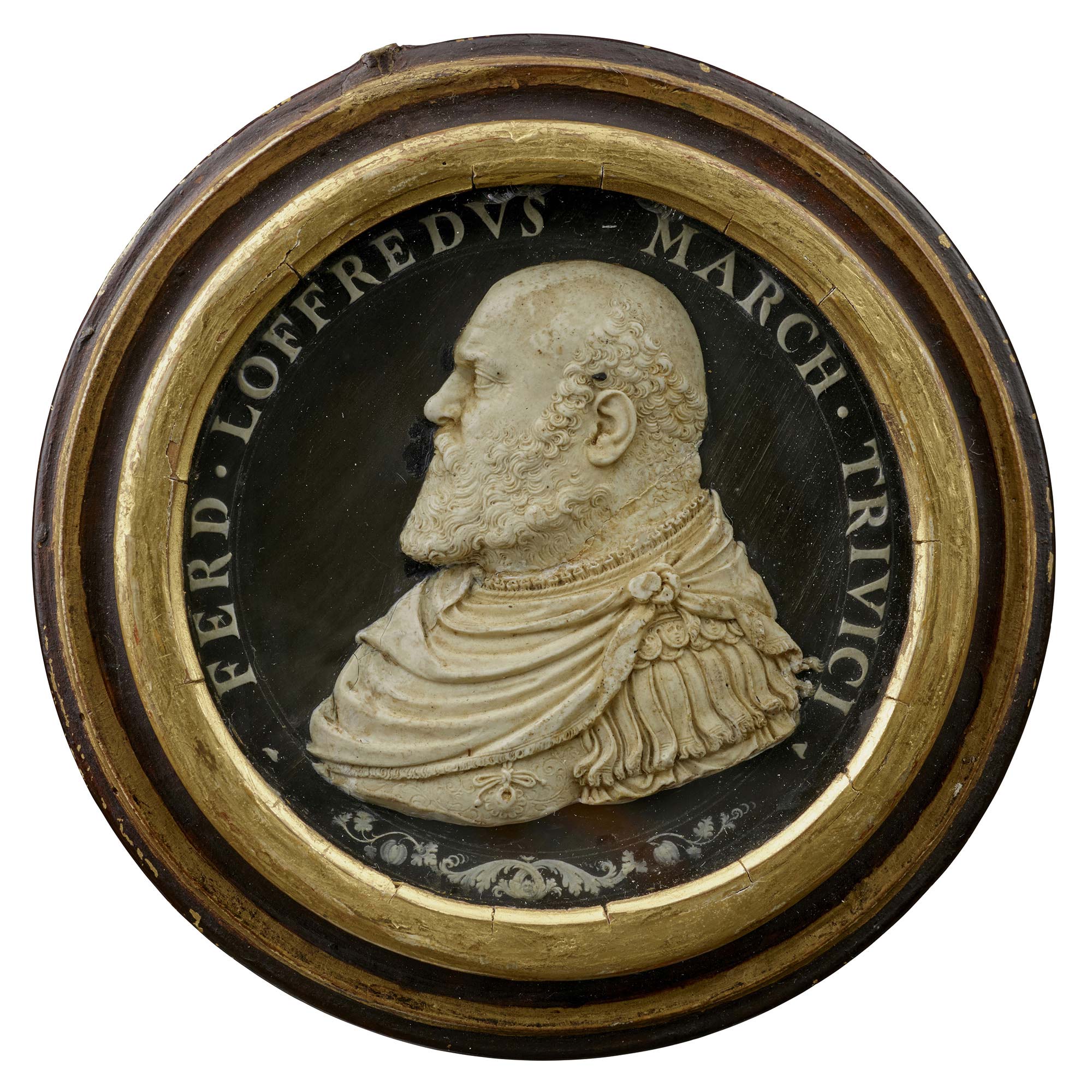 Wax model on a black background for a portrait medal of Ferrante Loffredo wearing armor with drapery, with curly hair and beard, in profile to the left, in a wooden frame