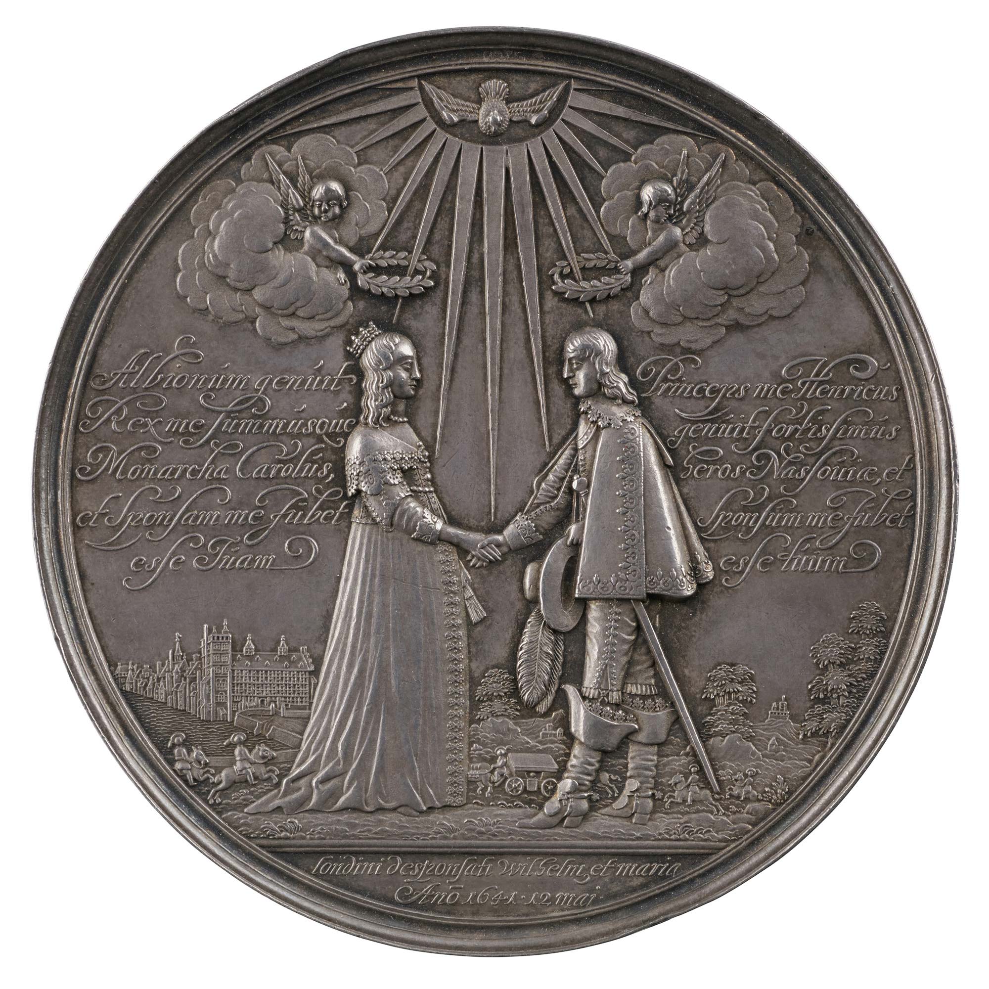 Silver medal of a man and woman joining hands and receiving laurel wreaths from angels