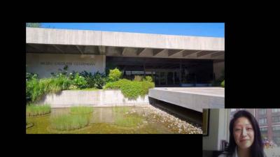 video still of facade of Calouste Gulbenkian Museum in Lisbon, with Aimee Ng in corner window