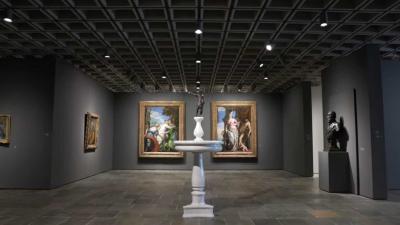 view of Frick Madison gallery with a statue on a pedestal in the center