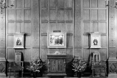photo of wall in gallery with paintings and table, plants,  chairs, circa 1955