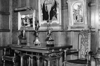 photo of paintings with table with sculptures and chairs, circa 1942
