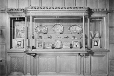 photo of enamels and paintings  in glass case, circa 1942