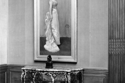 photo of painting of woman over table in gallery, circa 1964