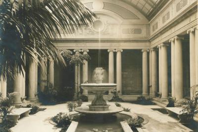 photo of garden court, with fountain, skylight, columns, plants, circa 1935