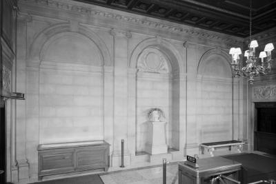 photo of entrance hall with till and small sign reading "exit"