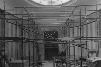 photo of room with oval skylight and scaffolding prepared for construction, circa 1935