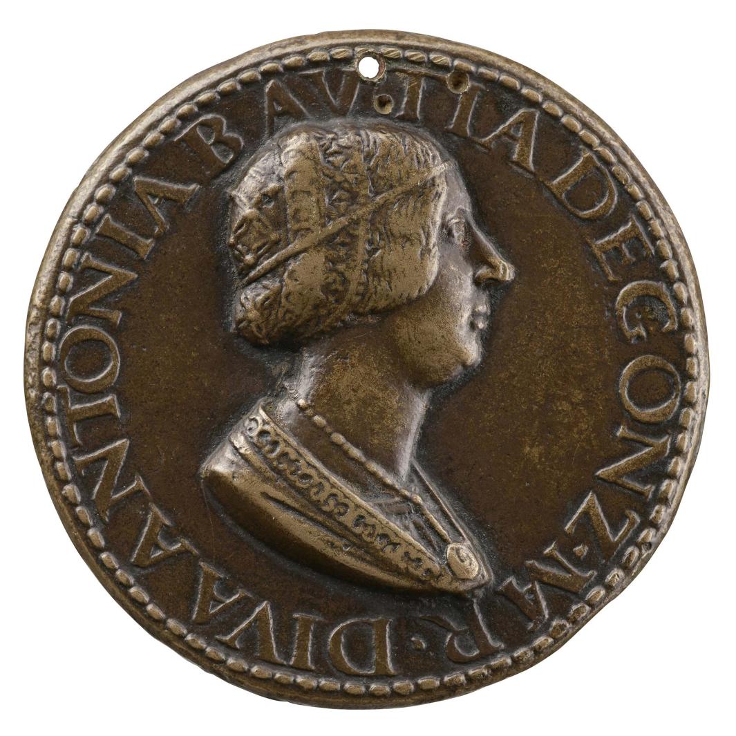 Bronze portrait medal of Antonia del Balzo wearing an elaborate hairnet and a necklace, in profile to the right; pearled border