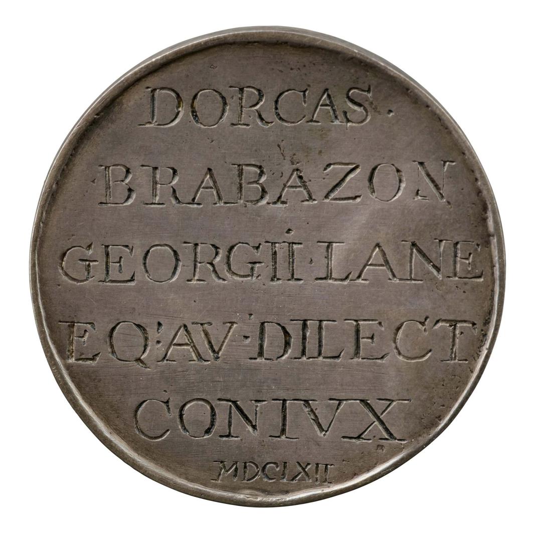 Silver medal with inscription 