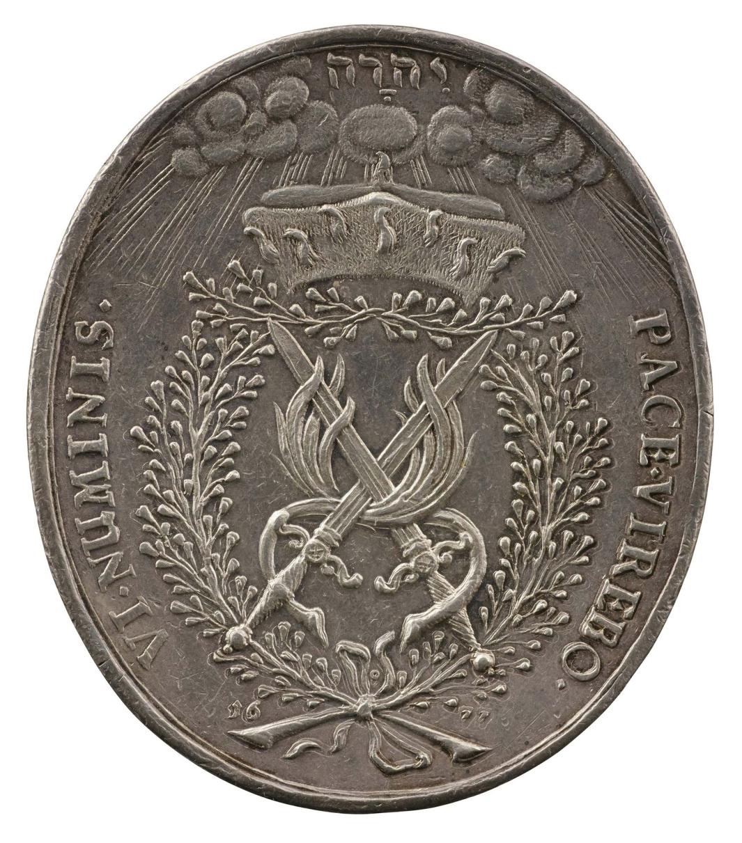 Silver medal depicting two swords and two palms between branches of rue 