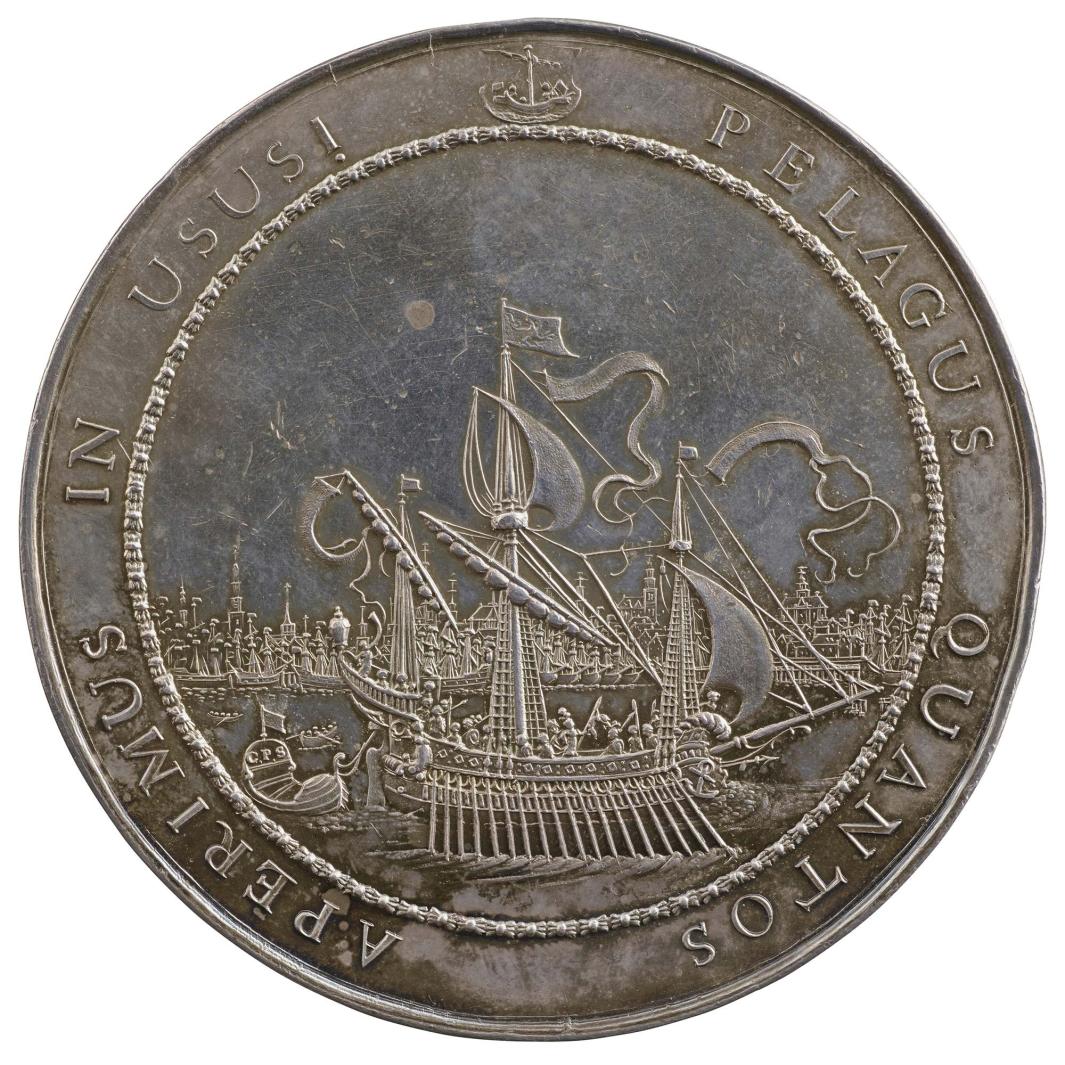 Silver medal depicting the legendary hero Jason holding the Golden Fleece aboard the ship Argo depicted as a fantastical galley with a view of Amsterdam in the background and the ancient arms of the city at the top 