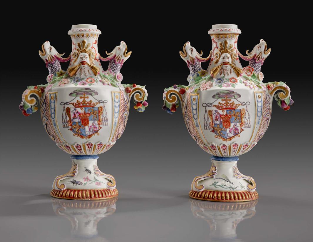 two pot-pourri vases decorated with dragons and coat of arms
