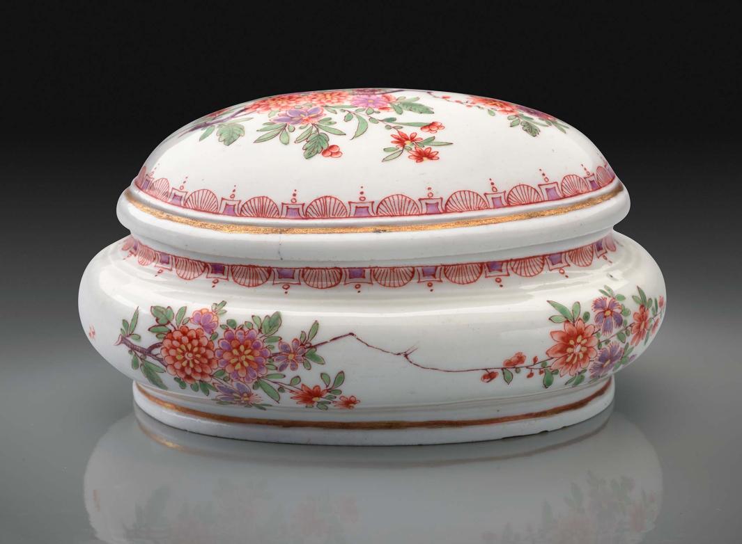 porcelain sugar box with lid decorated with red and purple flowers