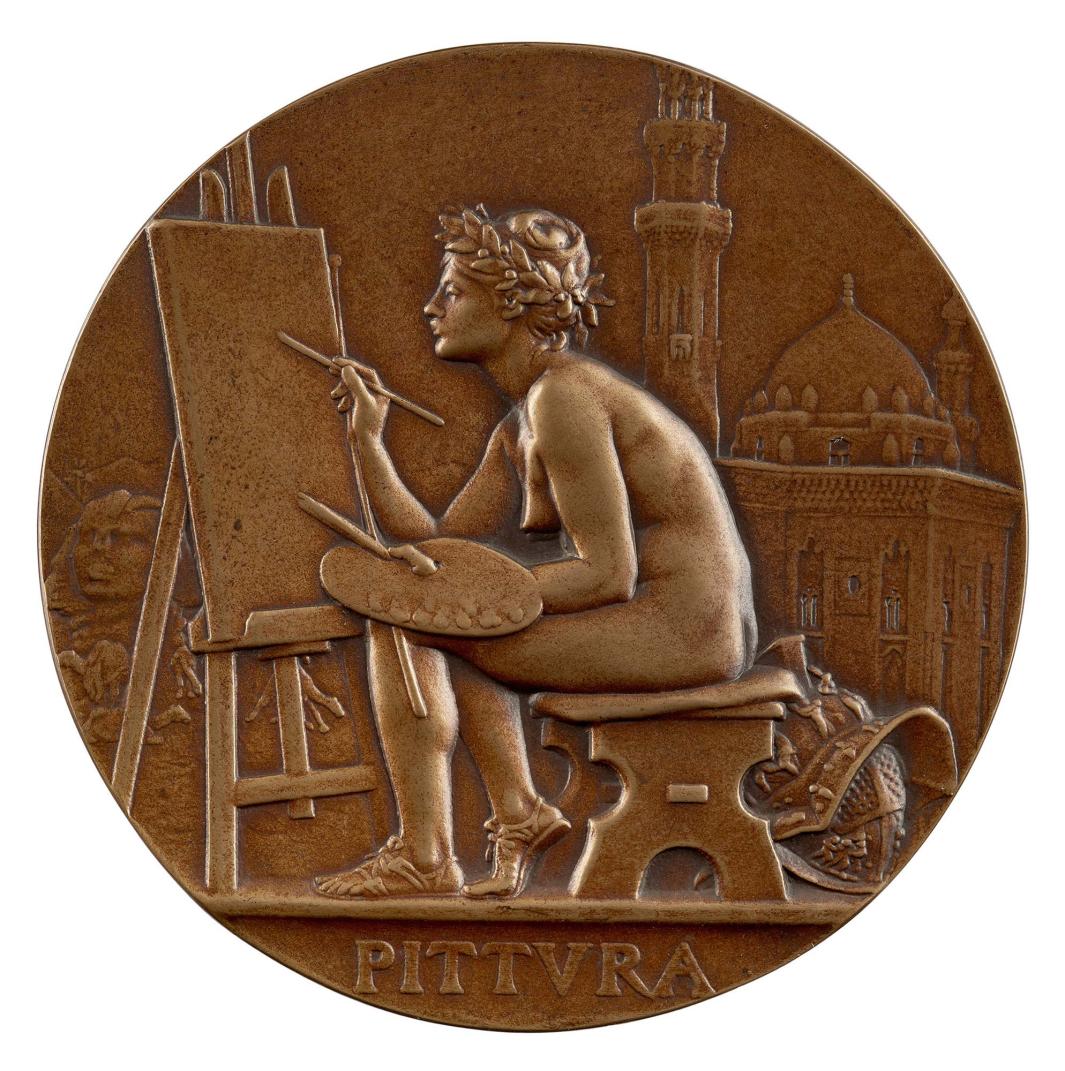 Bronze medal depicting an allegory of painting represented as a nude woman, laureate and seated on a bench in front of an easel, with a paintbrush in her right hand and a palette in her left and city in the background