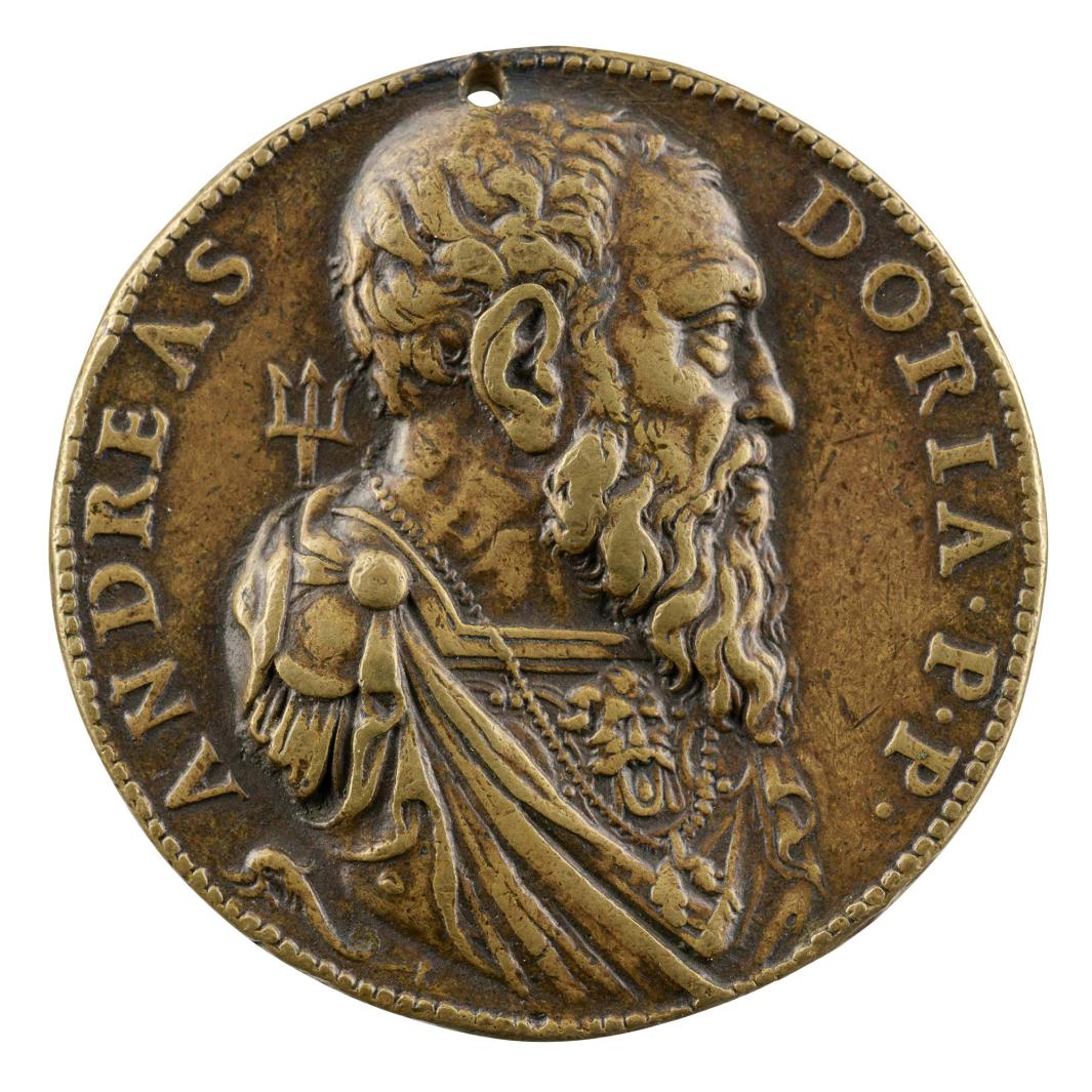 Bronze portrait medal of Andrea Doria wearing armor, with drapery pinned at the shoulders and a long chain, bearded, with a trident behind him, in profile to the right; pearled border