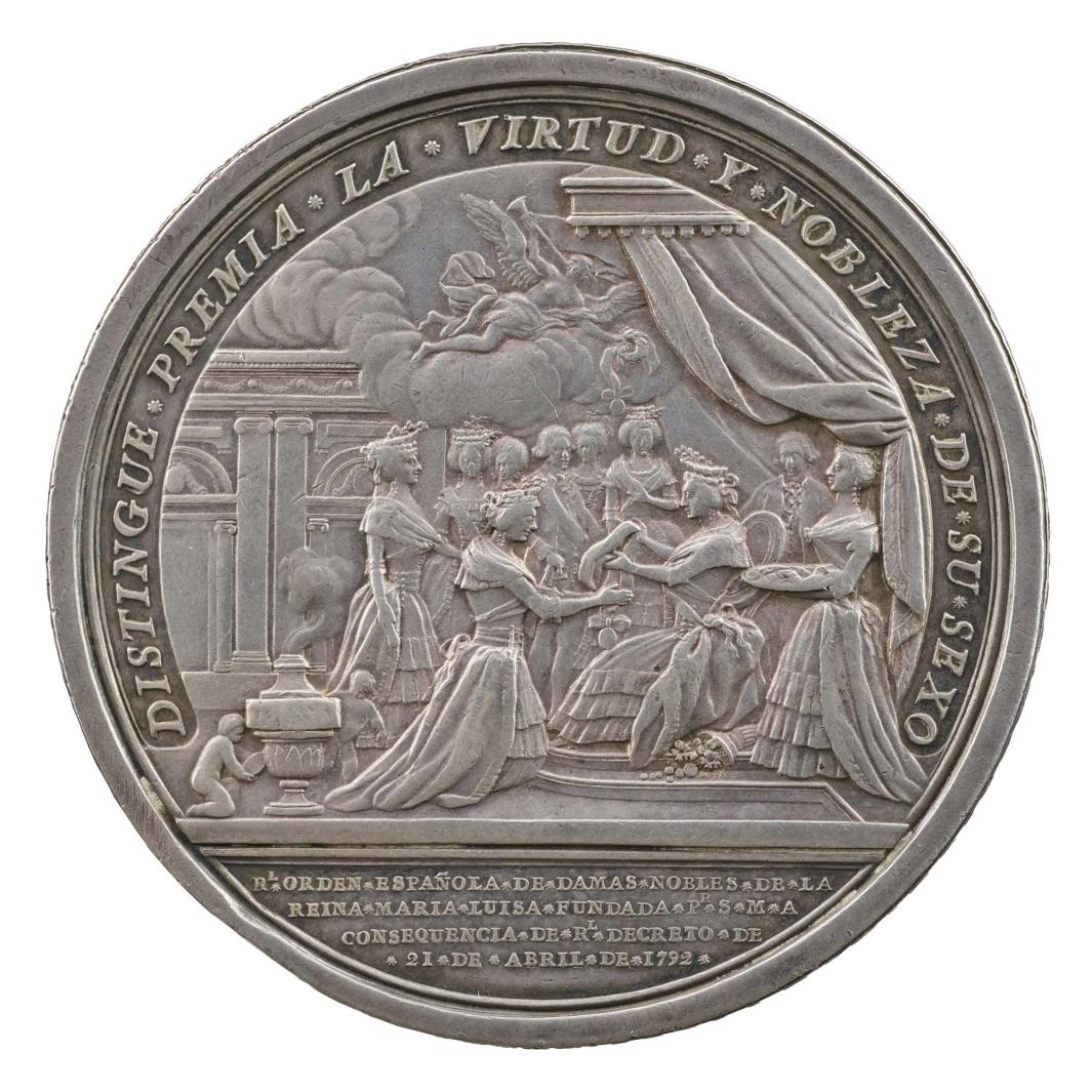 Silver medal of a queen sitting beneath a canopy in a neoclassical palatial setting with a cornucopia at her feet, surrounded by men and women of the court