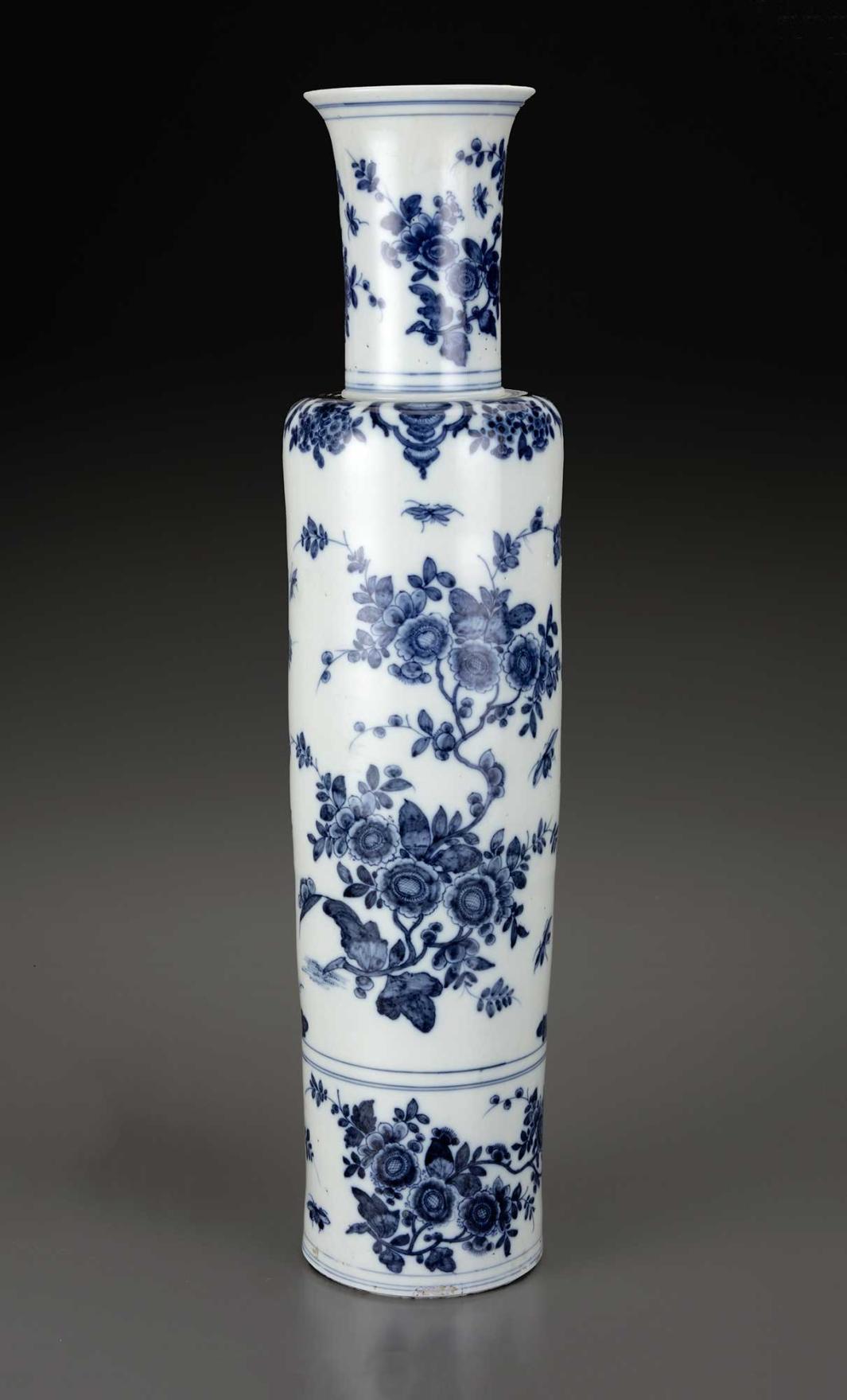 Tall vase with blue floral decoration