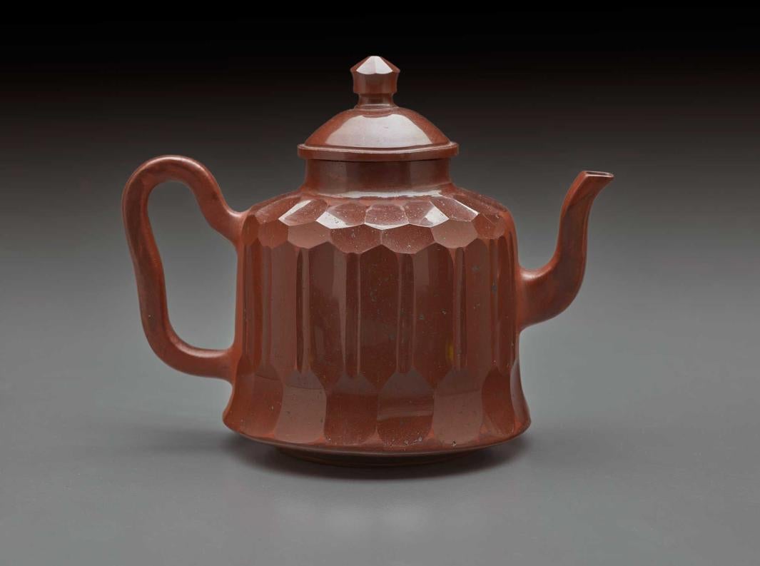 faceted teapot with shiny brown glaze