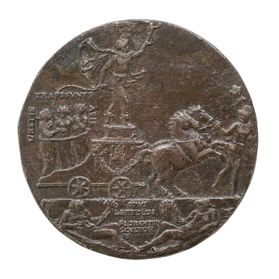 Reverse side of a bronze medal depicting a chariot.