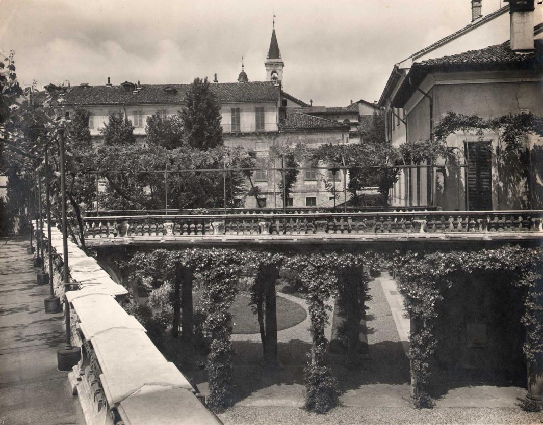 Photograph of a courtyard, as seen from a second story.