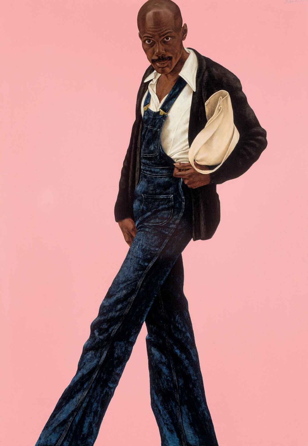 Portrait of a man in overalls with a bag under his left arm against a pink background