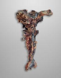 Abstracted glazed terracotta crucifix.