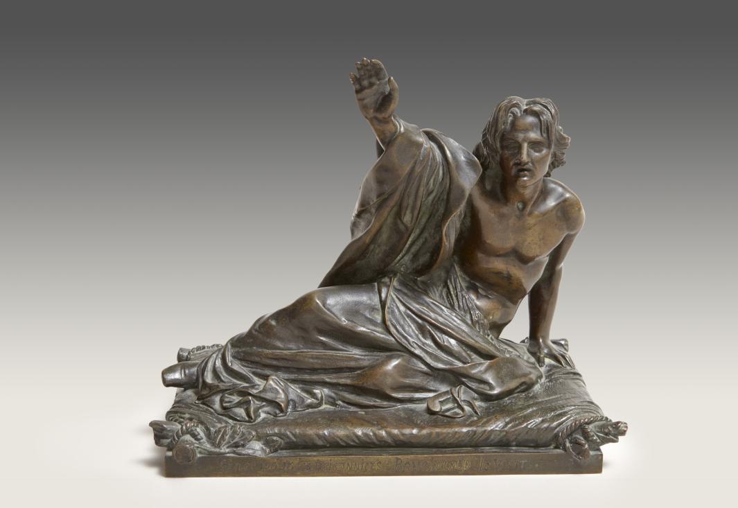 bronze sculpture of reclining man in toga, lifting himself up on one arm and raising the other