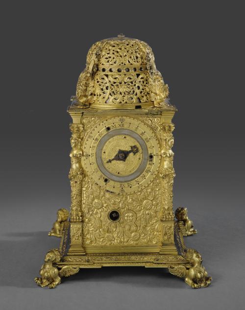 extremely ornate gilt-brass tower table clock, with angel at each foot of base