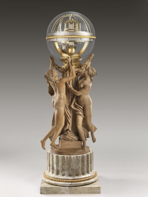 Spherical glass and gilt-brass clock supported by a terracotta sculpture of a pillar surrounded by three nude female figures