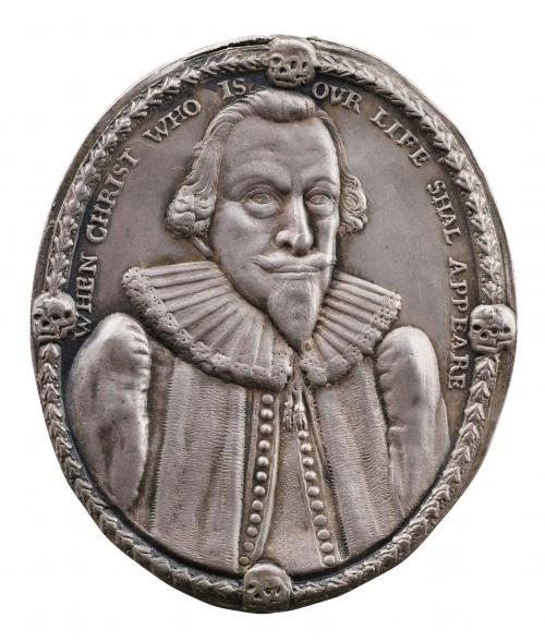 Silver portrait medal of Nicholas Wadham framed by a narrow wreath and four skulls (above, below, and flanking), wearing a falling ruff (trimmed) and plain doublet with set-in sleeves