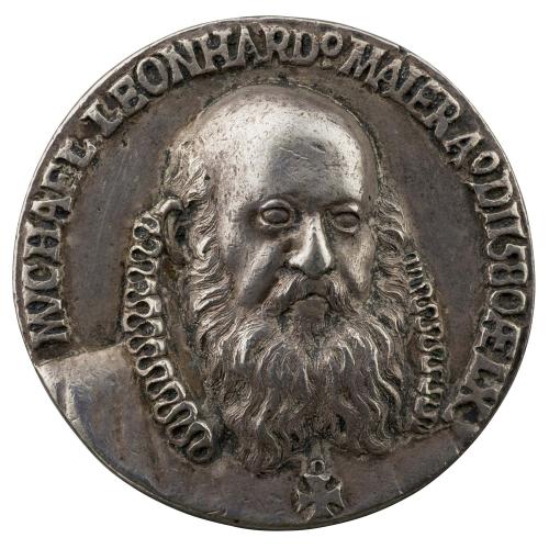 Silver medal of a balding man with mustache and beard, facing three quarters to the right and wearing ruff and cross