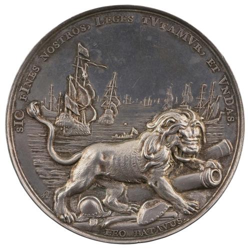 Silver medal depicting, in the foreground, lion standing upon implements of war, two cannons, a helmet, a shield, and an arquebus. In the background, warships are scattered over the sea