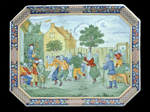 Earthenware tray depicting a scene of people dancing