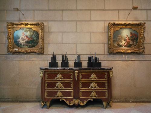 View of West Vestibule looking north with five sculptures of black porcelain and black steel on a commode