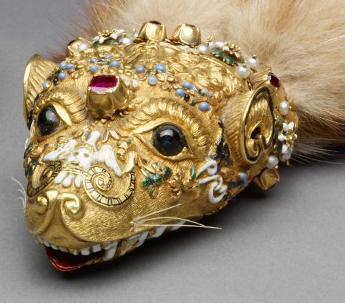 photo of gold and precious gem encrusted marten head