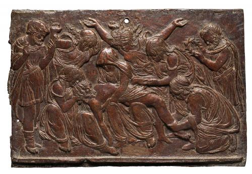 Bronze relief sculpture depicting a group of mourning figures surrounding the dead Christ.