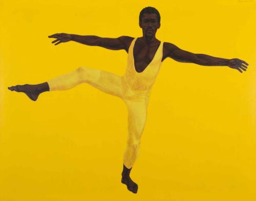 Portrait of a man in a yellow unitard with his right leg and arms extended to the side.